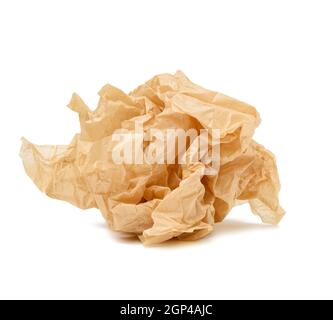 crumpled ball of brown sheet of parchment paper isolated on white background, element for designer Stock Photo