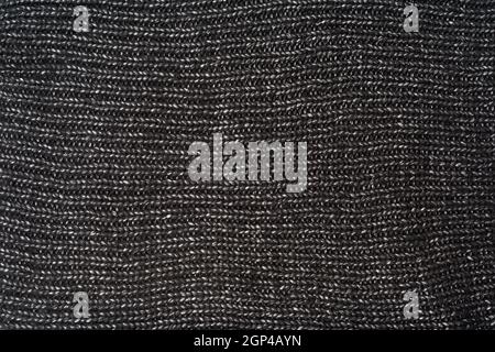 texture of black knitted woolen cloth, full frame Stock Photo