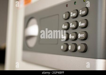 Safe lock code password pad number protection safety box bank closeup Stock Photo