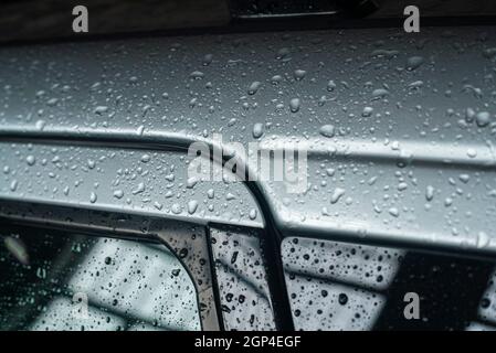 Macro Detail of water droplets on the car body Stock Photo