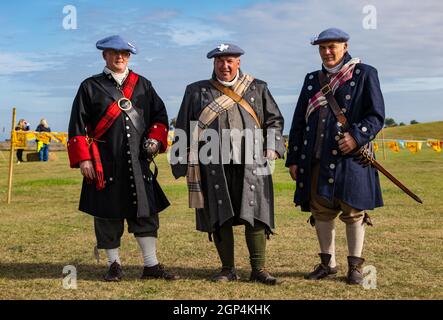 A group of Jacobite Scotsmen in period costume for re-enactment of Battle of Prestonpans, East Lothian, Scotland, UK Stock Photo