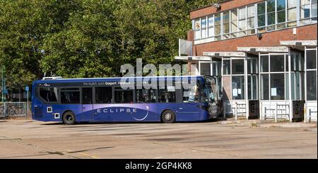 Gosport, Hampshire, England, UK. 2021.  A blue single deck local bus calling at a rather delapidated bus station in Gosport. Stock Photo