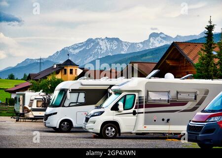 parking service area for motorhomes with socket for electricity, water, drainage of black and gray water Stock Photo