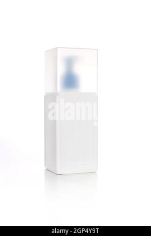White bottle isolated on a white background. Bottle for liquids, shampoo, cream, hair mask, perfumery. Template for design. Place for text. Free surfa Stock Photo