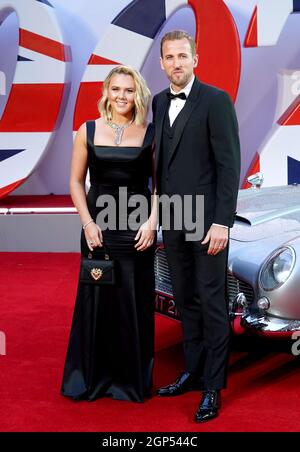 Katie Goodland and Harry Kane attending the World Premiere of No Time To Die, at the Royal Albert Hall in London. Picture date: Tuesday September 28, 2021. Stock Photo