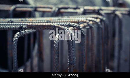 Dowel bar reinforcement concrete footing construction in process preparation industry abstract teamwork business. Stock Photo