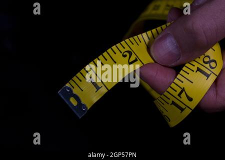 Fabric measuring tape soft tape for tailor, dressmaker, seamstress. Measuring ta Stock Photo