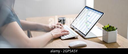 Gantt Chart Timeline Software On Convertible Laptop Stock Photo