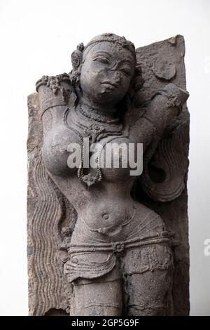 Salabhanjika, from 13th century found in Khondalite Konark, Odisha now exposed in the Indian Museum in Kolkata, West Bengal, India Stock Photo