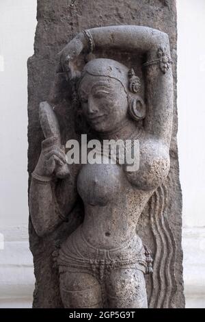 Darpanika, from 14th century found in Khondalite Puri, Odisha now exposed in the Indian Museum in Kolkata, West Bengal, India Stock Photo