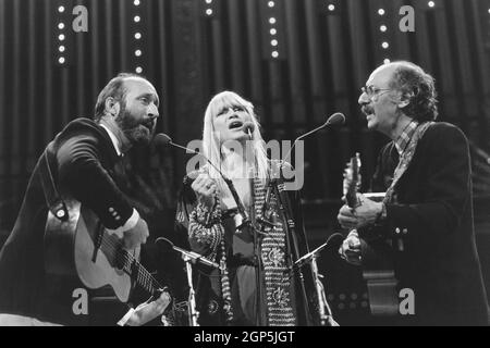 Folk group Peter, Paul and Mary, (from left: Noel Paul Stookey, Mary Travers, Peter Yarrow) in concert, circa 1987. Michael Lutch / TV Guide / courtesy Everett Collection