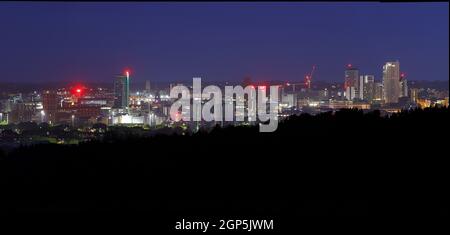 Leeds city centre at night viewed from Middleton Stock Photo