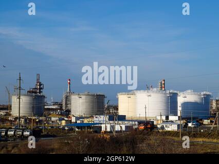 Refinery. Reservoirs for storage of refinery products. Rectification columns. Distillation columns, pipes and other equipment furnaces refinery. The o Stock Photo