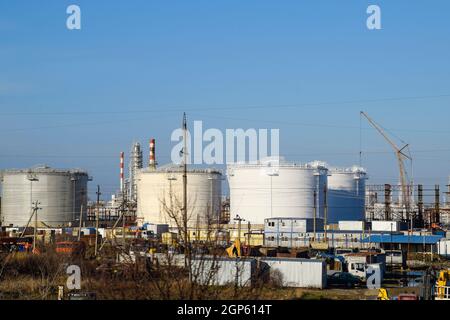 Refinery. Reservoirs for storage of refinery products. Rectification columns. Distillation columns, pipes and other equipment furnaces refinery. The o Stock Photo