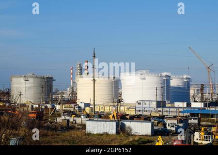 Refinery. Reservoirs for storage of refinery products. Rectification columns. Distillation columns, pipes and other equipment furnaces refinery. The o Stock Photo