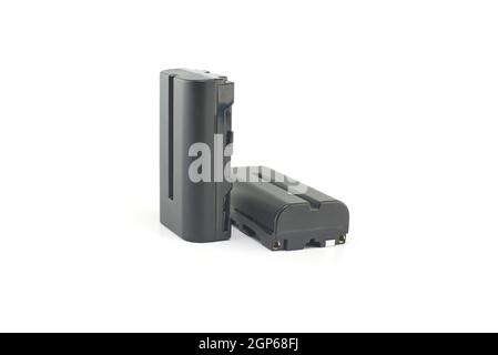 Two NP-F type rechargeable batteries isolated on a white background, electronics and camera equipment Stock Photo