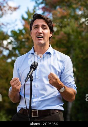 Prime Minister Justin Trudeau makes a point while speaking at a press conference at the Eva James Memorial Community Centre in Kanata. Stock Photo