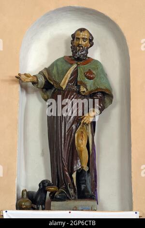 Saint Roch, statue in the parish church of St. Anne in Sveta Jana, Croatia Stock Photo
