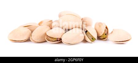 Pistachio nuts, isolated on white background. Salted roasted pistachios. Stock Photo