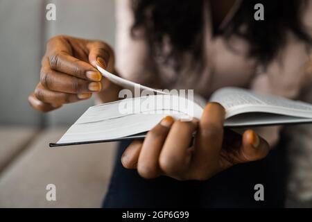 American African Prayer Woman Studying Bible Book In Hands Stock Photo