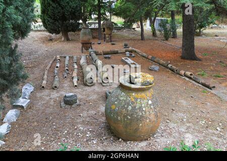 PIpe and storage vessels at the Ancient City of Troy, famous for the legendary Trojan Horse and War, is near the town of Tevfikiye, Turkey. Stock Photo