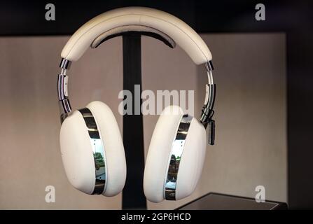 White big headphones exposed in the shop windos Stock Photo