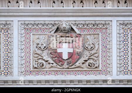 Coats of arms of prominent families that contributed to the facade., Portal of Cattedrale di Santa Maria del Fiore (Cathedral of Saint Mary of the Flo Stock Photo