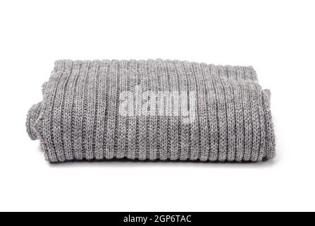 folded gray knitted scarf isolated on white background, close up Stock Photo