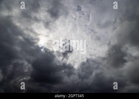 grey incoming storm clouds full frame background Stock Photo