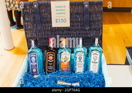 England, Hampshire, Laverton, Bombay Sapphire Gin Distillery, Retail Shop, Display of Bombay Sapphire Products for Sale Stock Photo