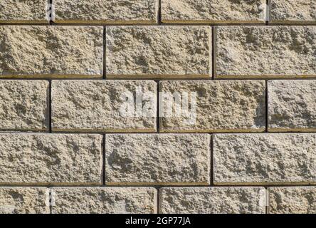 Background from the wall of white brick. yellow beige brick. Brick texture. Seamless design vintage style yellow beige cream tone brick wall detailed Stock Photo