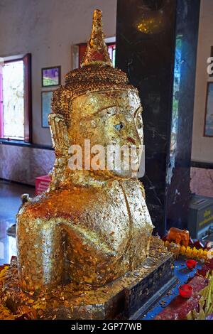Buddha statue covered with gold leaf, Temple Wat Phra Thong, Phuket, Thailand Stock Photo