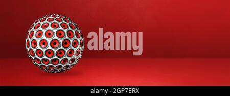 Speakers sphere isolated on a red studio banner. 3D illustration Stock Photo