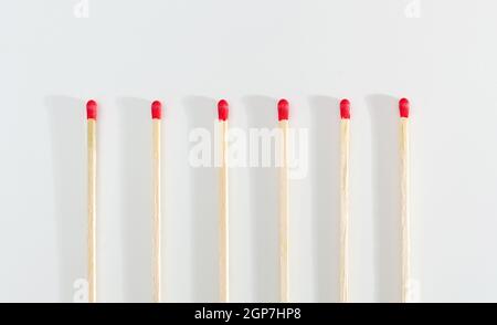Many matches sticks for lighting a fire on white background. Stock Photo
