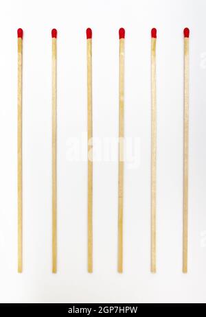 Many matches sticks for lighting a fire on white background. Stock Photo