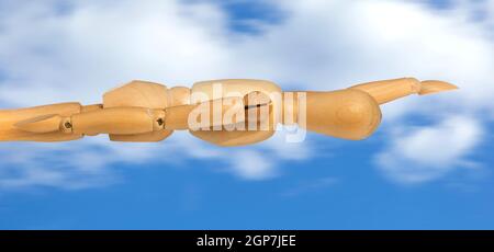 Dummy superhero in flight on blue sky with clouds. Stock Photo