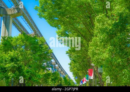 Tama Monorail and the fresh green. Shooting Location: Tokyo Tachikawa Stock Photo