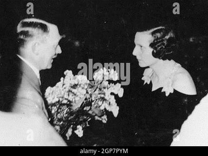 LENI RIEFENSTAHL (1902-2003) German film director and actress is congratulated by Adolf Hitler on her 1938 film  Olympia celebrating the Summer Olympics in Berlin in 1936. Stock Photo