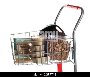 Sshopping cart full of dog food on white background Stock Photo