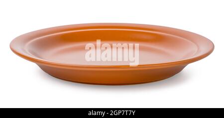 Round clay plate isolated on a white background Stock Photo