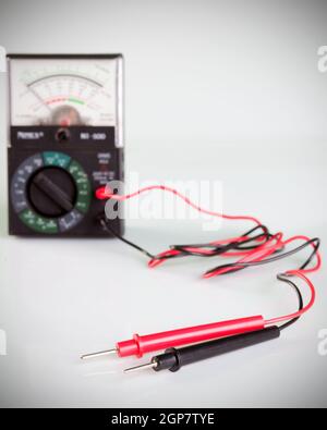 Multimeter with probe isolated on white background Stock Photo