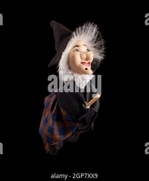 Bologna, Italy, January 2022 The Befana with a witch broom on red  background. Traditional witch costume for Italian Epiphany day. 5203299  Stock Photo at Vecteezy