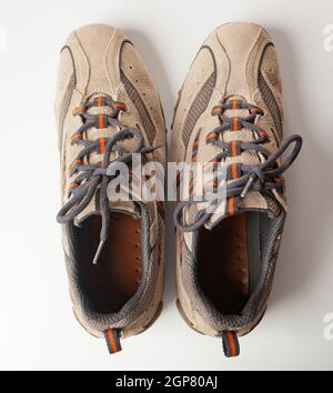 Pair of shoes in reverse. Concept of OCD, Obsessive compulsive personality disorder. Stock Photo
