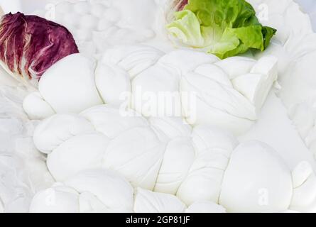 Mozzarella di Bufala typical dairy product of the Campania region of southern Italy. It is produced in different forms, in this case in the form of a Stock Photo