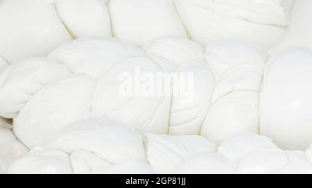 Mozzarella di Bufala typical dairy product of the Campania region of southern Italy. It is produced in different forms, in this case in the form of a Stock Photo