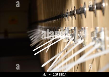 School lockers are zip tied shut to prevent contact and ensure social distancing in a global pandemic. Stock Photo