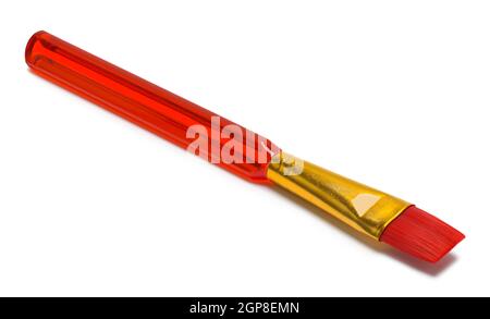 Single Red Watercolor Paint Brush Cut Out on White. Stock Photo