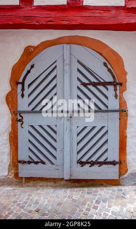 historic wooden door seen in Wertheim am Main in Southern Germany Stock Photo