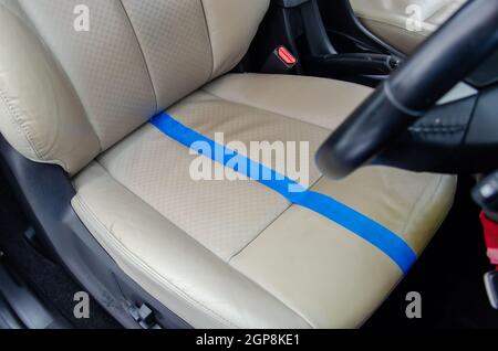 Before and after the leather seat cleaning service. Stock Photo