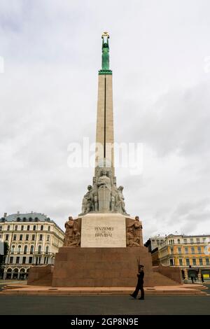 Guards of Honor from the National Armed Forces in front of the Freedom Monument - statue known as Milda Stock Photo